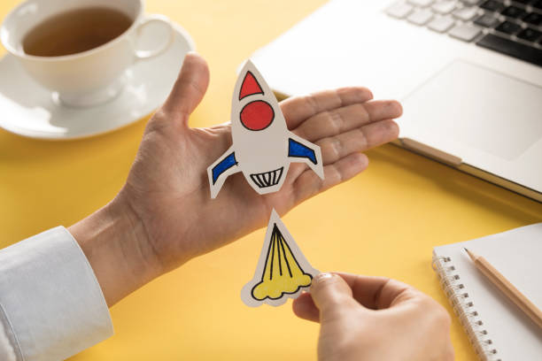 istock Business Person with Startup Rocket 1133418436
