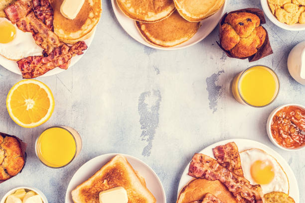 istock Healthy Full American Breakfast with Eggs Bacon Pancakes and Latkes 1133418679