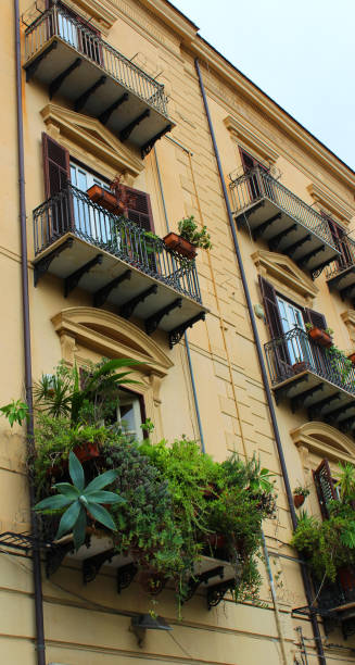 istock Typical 19th century Palermo marble balconies with wrought iron support brackets 1133419107