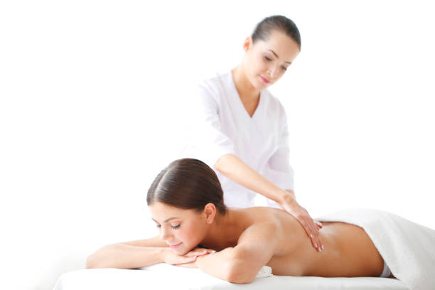 女性取得マッサージ - massage therapist massaging spa treatment relaxation ストックフォトと画像