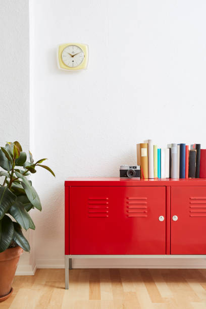 istock books and camera on red metal locker clean room 1133431030