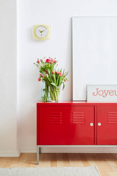 istock minimalist concept frames flowers and red metal locker 1133431080