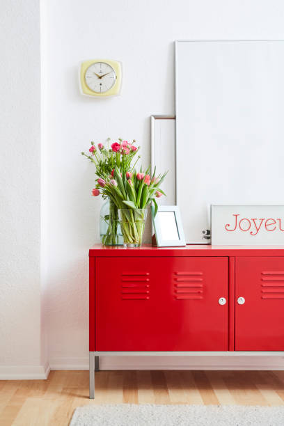 istock red metal locker picture frames and flowers 1133431360