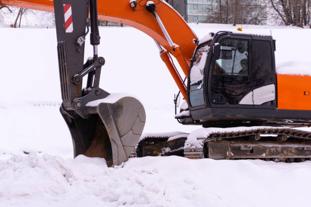 istock excavators on a winter building site 1133434337