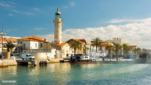 Channel And Lighthouse In Grau Du Roi Camargue France Stock Photo - Download Image Now