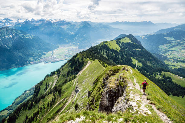 Gone walk between Augstmatthorn and Harder near Interlaken, Bernese Oberland, Switzerland Tightrope walk between Augstmatthorn and Harder near Interlaken, Bernese Oberland, Switzerland switzerland stock pictures, royalty-free photos & images