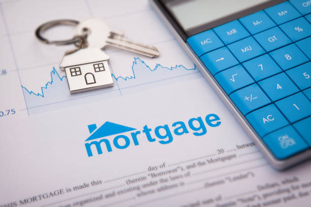 An empty mortgage application form with house key stock photo