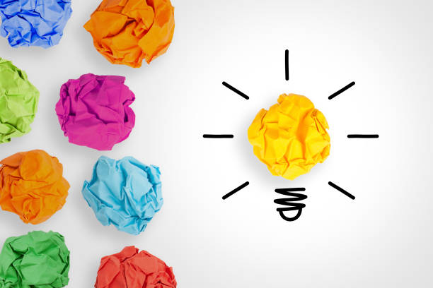istock Creative Idea Concepts Light Bulb Crumpled Paper on White Background 1133438618