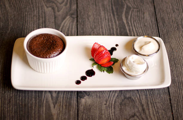 istock Chocolate cake with ice cream and fresh strawberries 1133439232