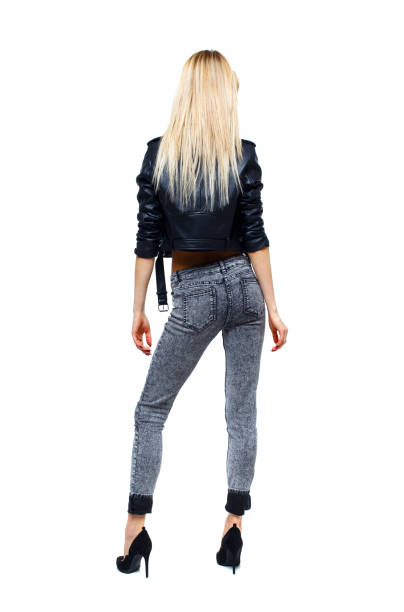 istock Back view of a woman standing. 1133439334