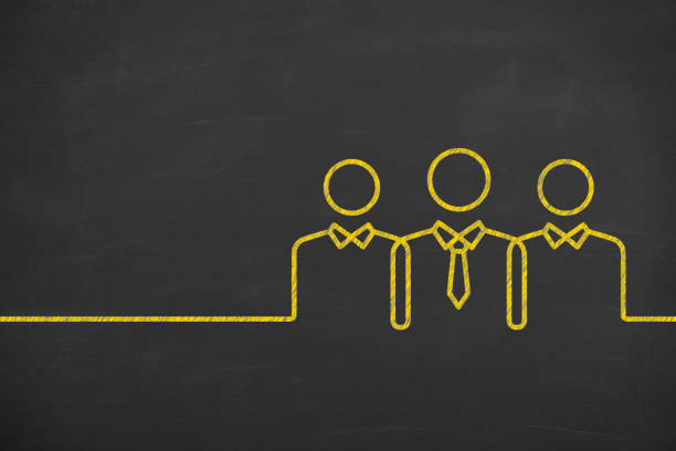 Teamwork Concepts with Business Person on Chalkboard Background