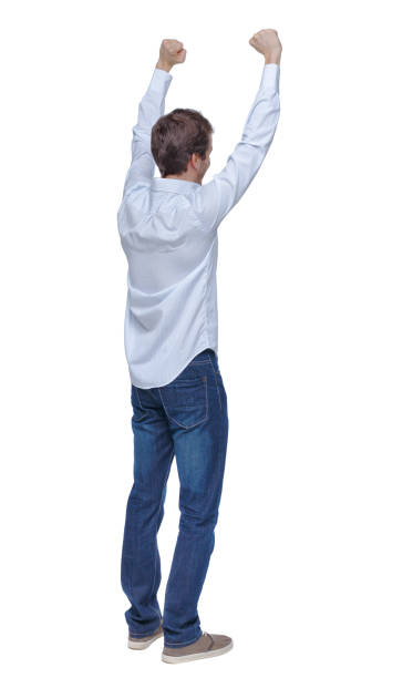 istock Back view of a man celebrating victory. 1133439441