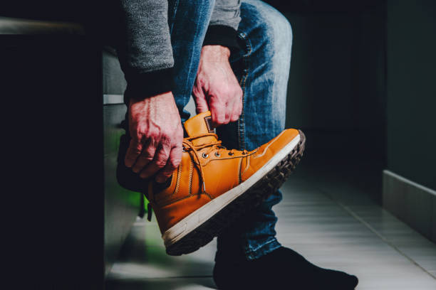 istock Putting shoes in the hall, preparing for the exit. 1133439557