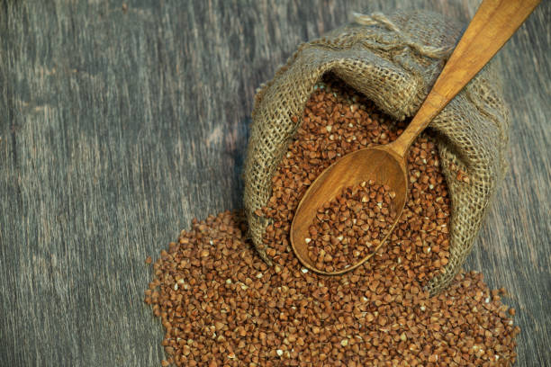 istock buckwheat grains on wooden background 1133439751