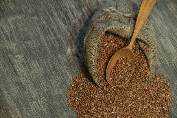 istock buckwheat grains on wooden background 1133440364