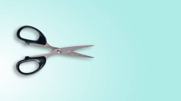 istock Top view of cutting scissors isolated on a pastel background. 1133441870