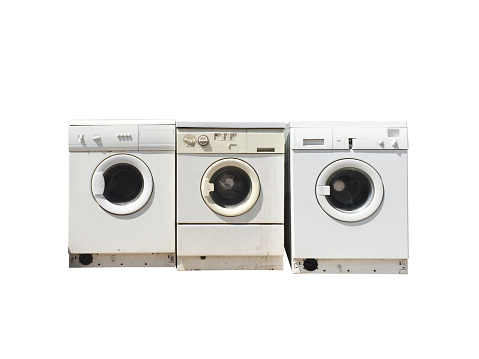 Group of old broken washing machines isolated on white background with (clipping path)