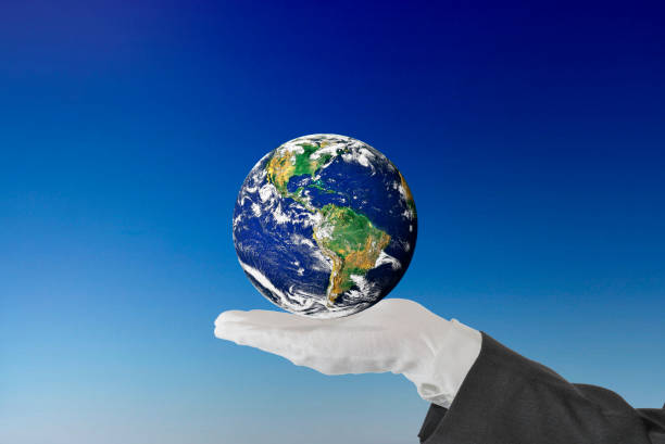 istock The whole world in hand (NASA Elements) 1133445712