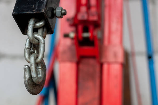 auto mechanic lifting machine. transport service equipment. hook on strong chain.