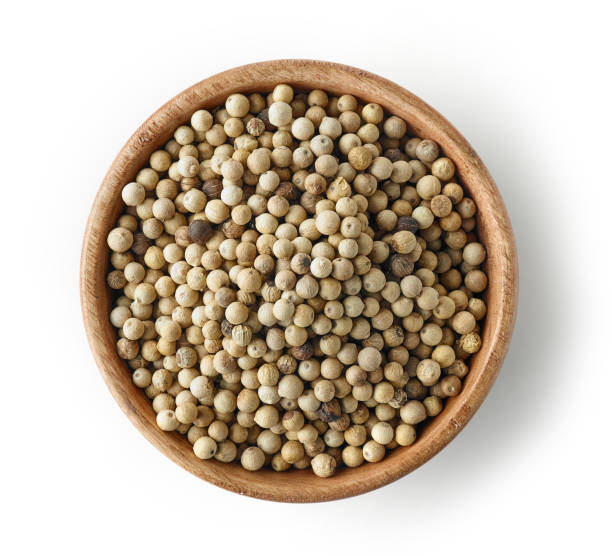 istock wooden bowl of white pepper 1133451112