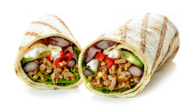 istock Tortilla wrap with fried minced meat and vegetables 1133451122