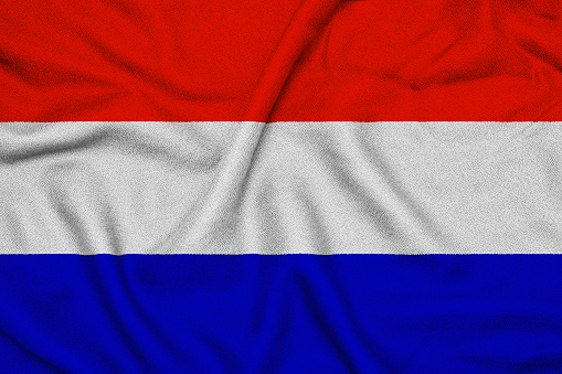 Waving flag of the Netherlands with textural folds.