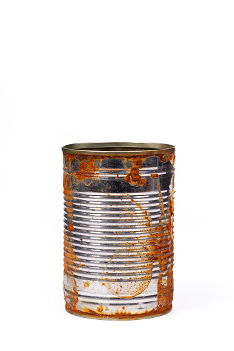 Upright standing rusty tin can isolated on white background, clipping path included