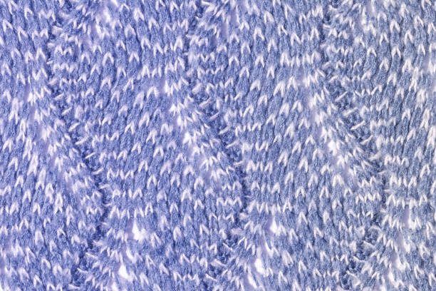 istock Wool purple fabric close up. Background with knitted texture, wave pattern. Basis for layouts. 1133454537