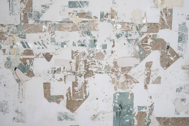 The aged tape marks on the white wall