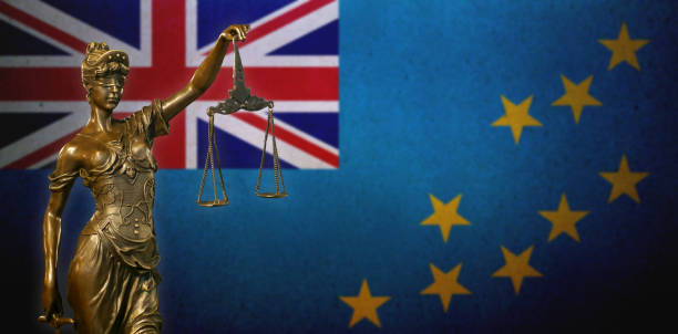 istock Lady Justice before a flag of Tuvalu 1133458650
