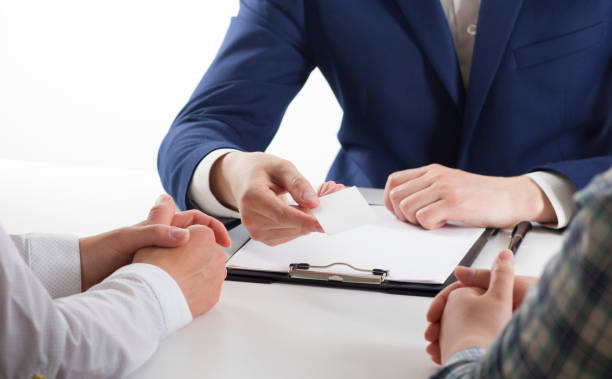 istock business executive exchanging business card blank 1133459896