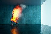 Burning businessman in the office