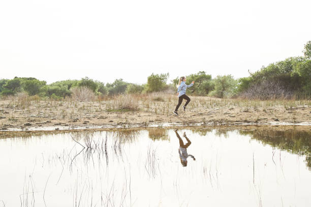 istock Woman Running Outdoors 1133463269