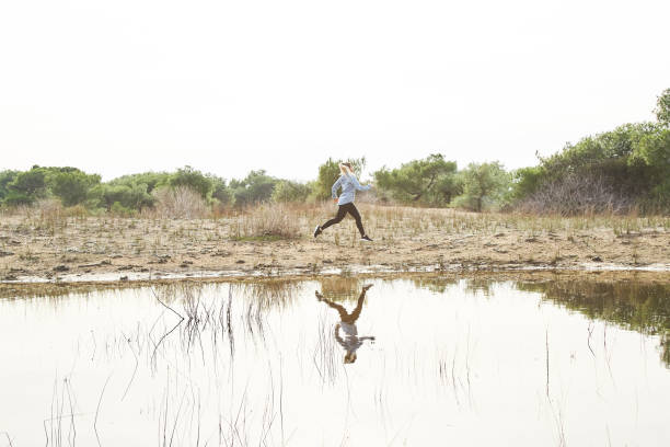 istock Woman Running Outdoors 1133463270