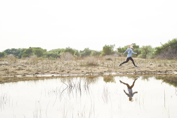 istock Woman Running Outdoors 1133463274