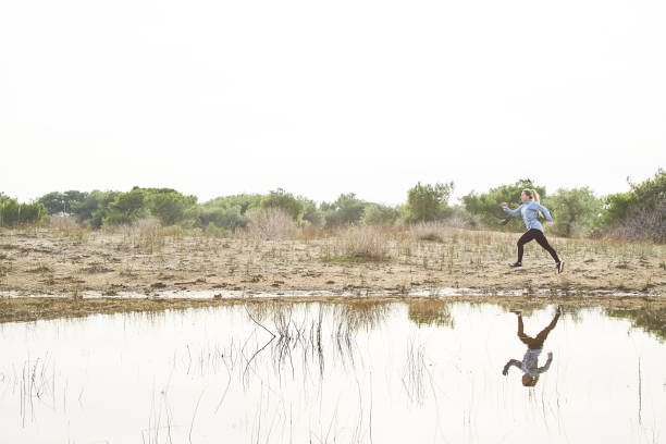 istock Woman Running Outdoors 1133463279