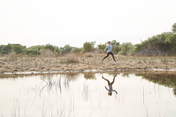 istock Woman Running Outdoors 1133463282