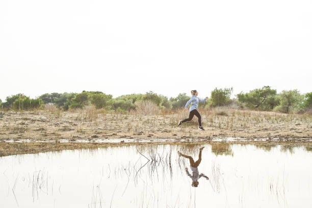 istock Woman Running Outdoors 1133463285