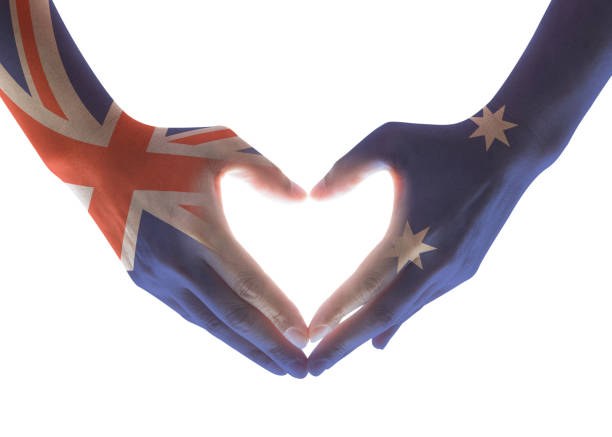 australia national flag  on people hands in heart shape isolated on white background for labour day and national holiday celebration - australia australia day celebration flag imagens e fotografias de stock