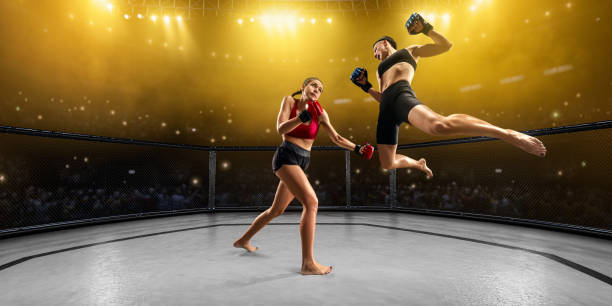istock Female MMA fighters in professional boxing ring 1133468123