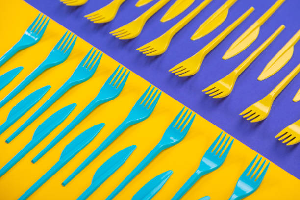 istock Colorful set of plastic table ware isolated on background 1133468580