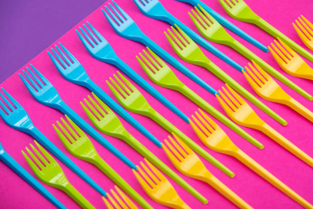 istock Many color plastic forks on a bright background 1133468594