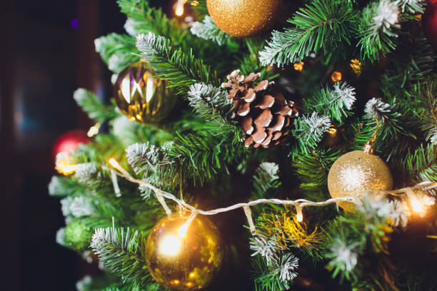 istock Christmas background - baubles and branch of spruce tree. 1133468669