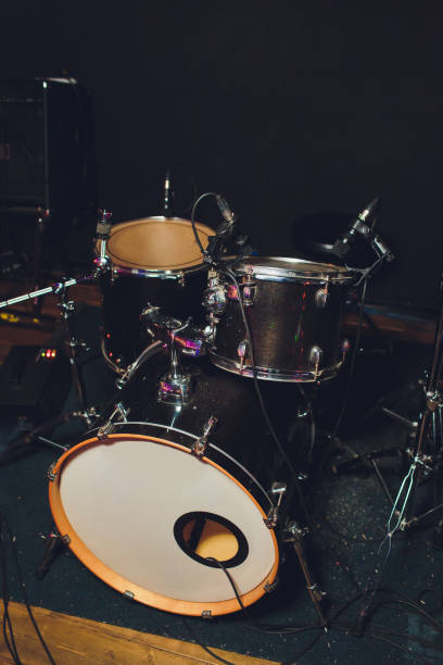 istock Modern drum set shot in smoky dark studio. 1133468686