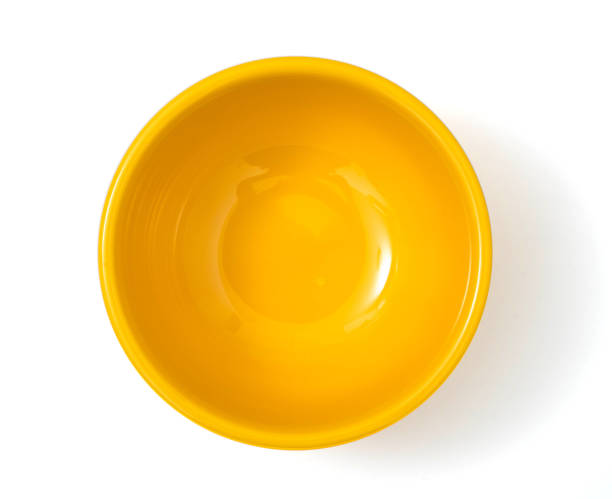 istock Yellow bowl isolated on white background 1133468868
