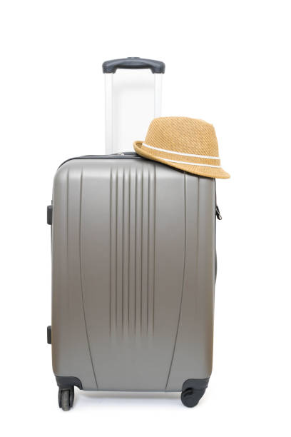 istock summer holidays travel concept suitcase or luggage bag with hat 1133468921