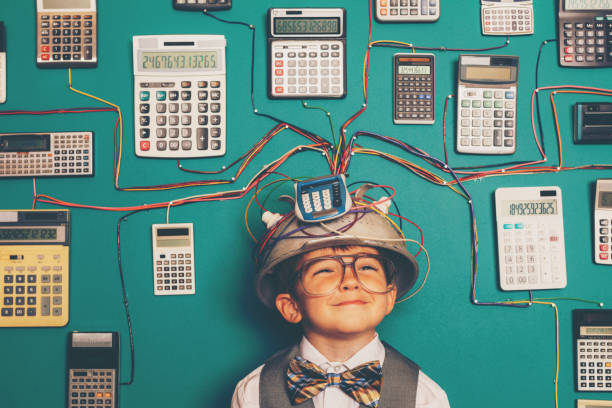 istock Young Nerd Boy with Calculator Invention 1133471905