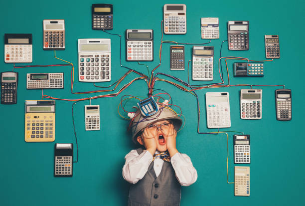 istock Young Nerd Boy with Calculator Invention 1133471971