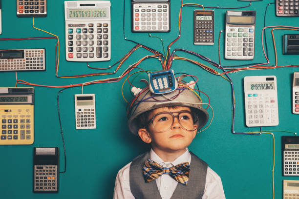 istock Young Nerd Boy with Calculator Invention 1133472028