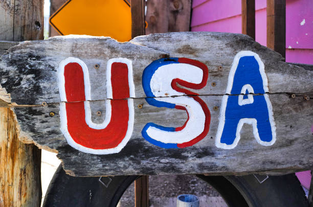 istock USA lettering painted on a wooden board 1133475999